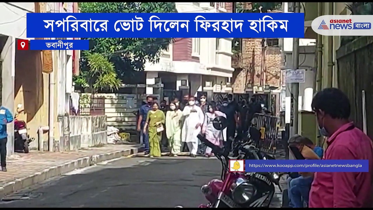 Firhad Hakim with his family casts his vote