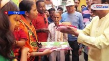 TMC workers distribute saree-towels to local people in Bankura as a gift of Chhath Puja