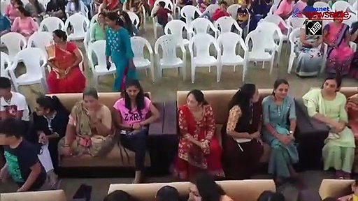 34 couples marry in mass wedding ceremony; grooms receive helmets