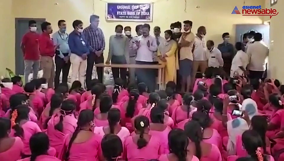 Karnataka MLA distributes ration kits to ASHA workers paying no heed to social distancing norms