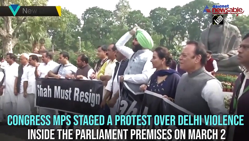 ‘Shah must resign’: Congress , AAP, TMC protest against Delhi violence inside Parliament premises