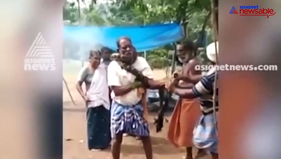 Python coils around man's neck; watch what happened next