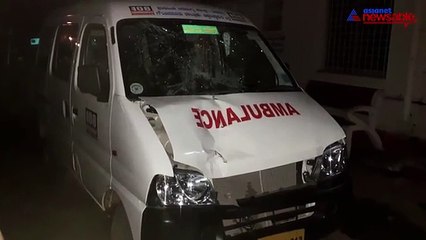 Ambulance hits pedestrian woman