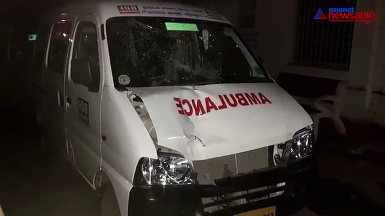 Ambulance hits pedestrian woman