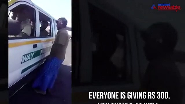 Police, caught on camera, taking bribe from truck drivers on highway