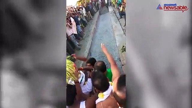 Priest falls in the burning strip of coal, severely injured