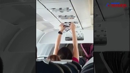 This woman passenger uses the aeroplane's AC vent to dry her wet underwear. Here's how