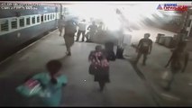 Woman falls while boarding train, escapes a major accident by a whisker