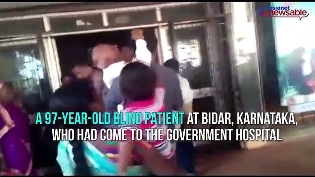 Helpless man carries blind grandfather up two floors with no availability of wheelchair