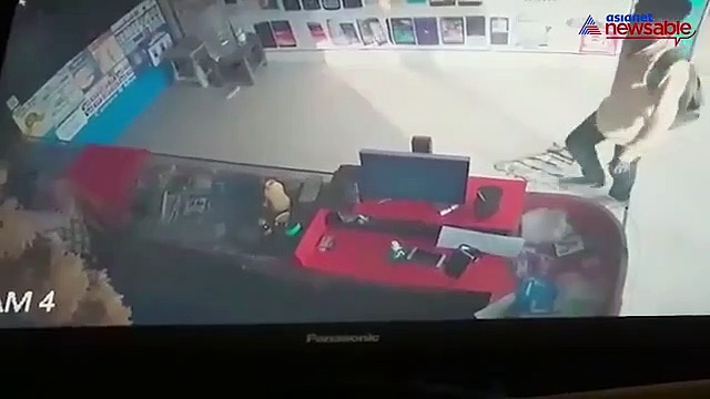 Watch: Man steals mobile phone from Nelamangala shop