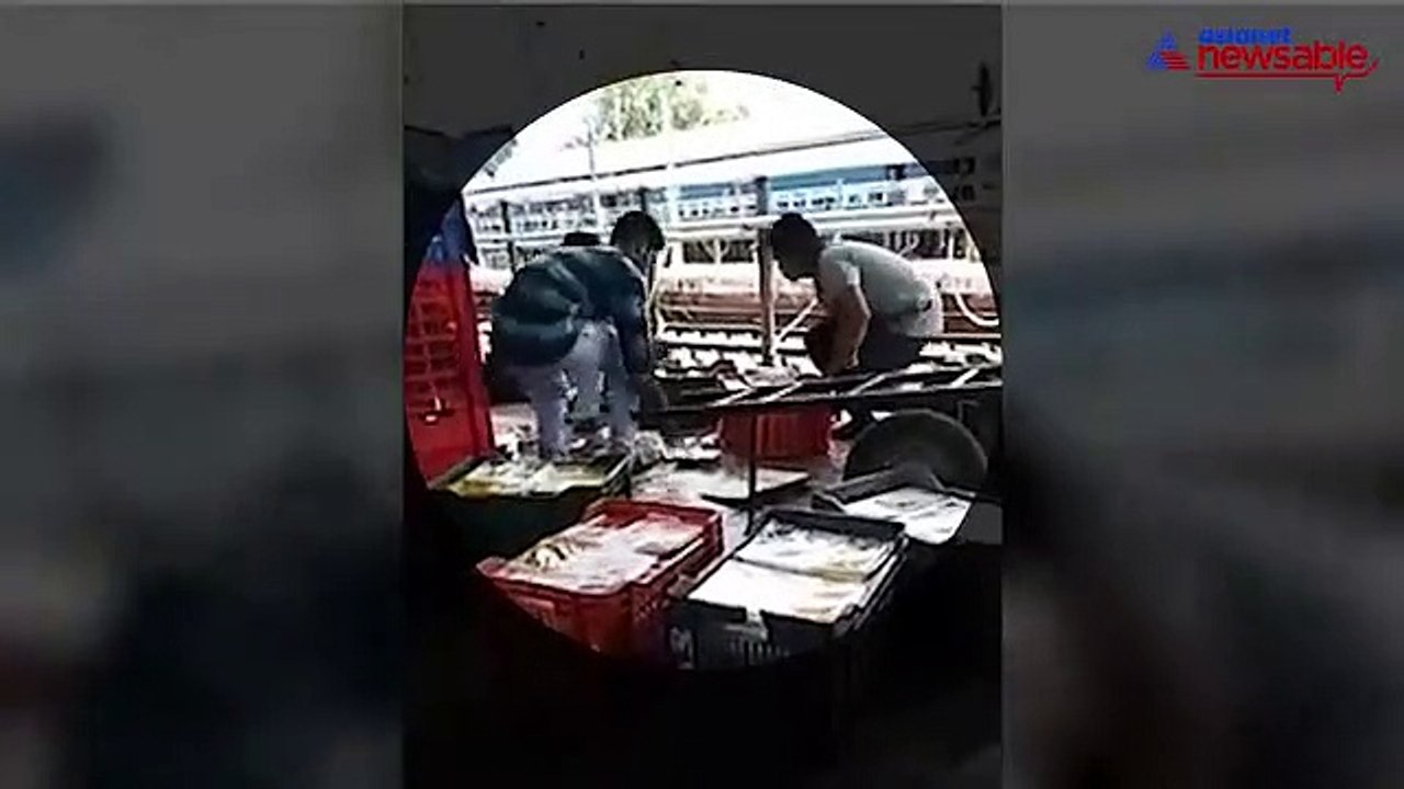 Railway staff in Vizag put spilt food back into boxes to serve