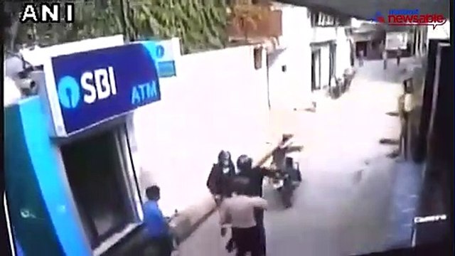 Security guard comes to the rescue of this ATM that was about to be robbed