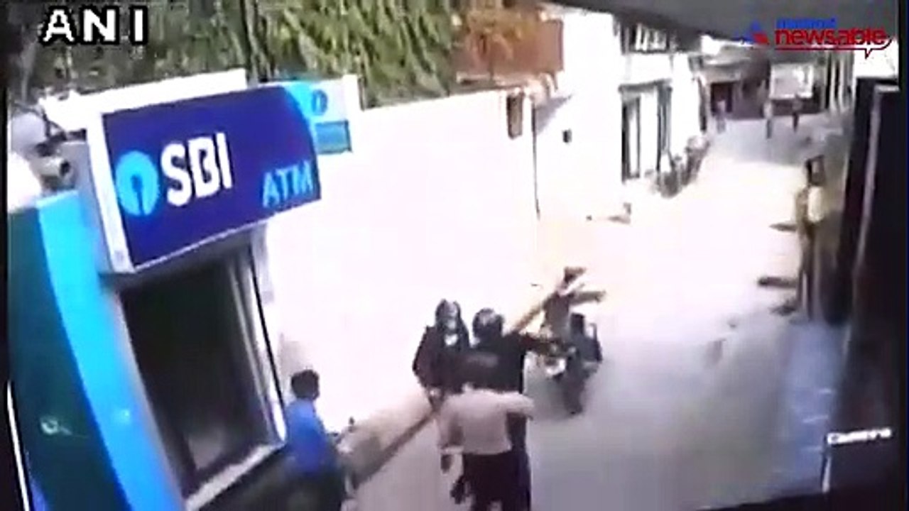 Security guard comes to the rescue of this ATM that was about to be robbed