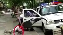 Watch: Cop throws mother and baby to ground over parking ticket