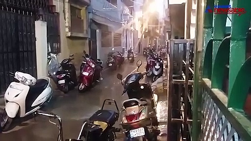 Sudden rainfall takes Bengalureans by pleasant surprise; Commuters seek shelter