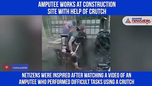 Video of amputee working at construction site using crutch wins hearts of netizens