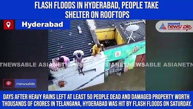 Flash floods in Hyderabad, people take shelter on rooftops