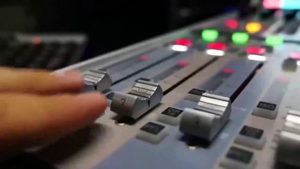 Man sticking a cup to face