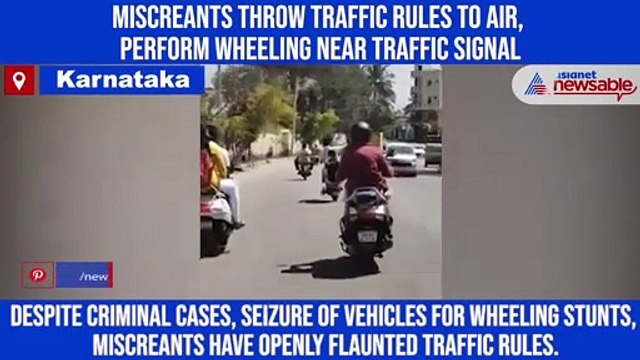 Miscreants throw traffic rules to air, perform wheeling near traffic signal