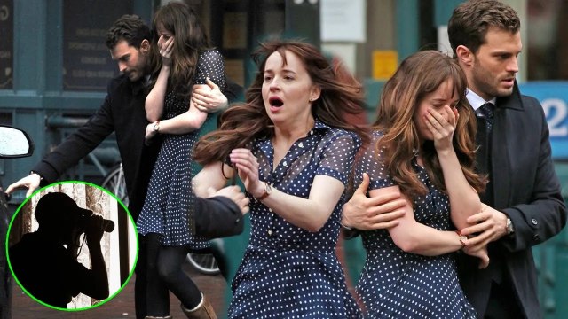 Jamie Dornan rescues Dakota Johnson from a perverted paparazzi