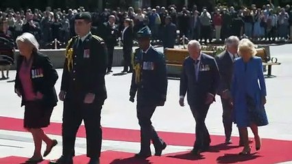 Charles honours the fallen at Canada's National War Memorial