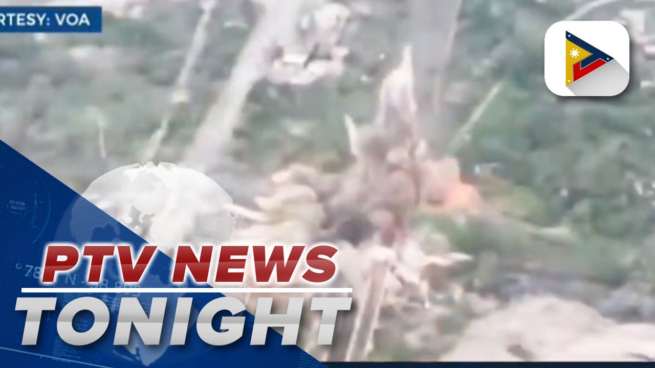 Ukraine forces blow up bridge to thwart Russian advance; Biden heads to South Korea and Japan
