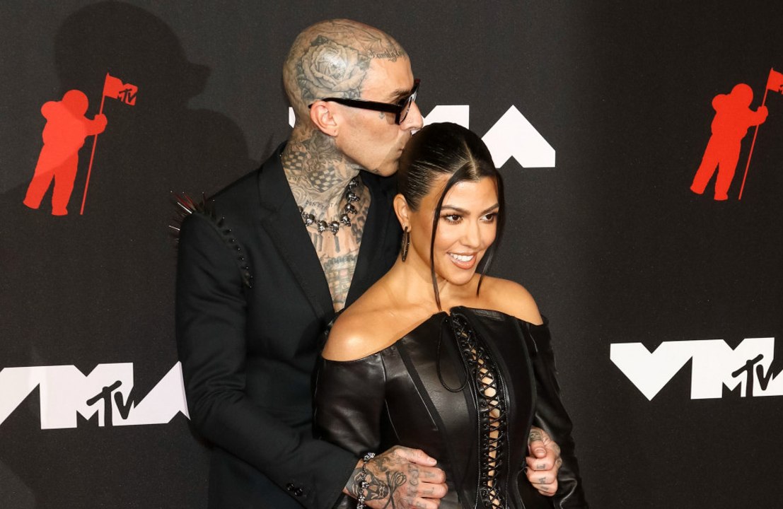 Third time lucky! Kourtney Kardashian and Travis Barker marry - again