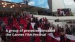 Protest group invades Cannes Film Festival to highlight violence towards women