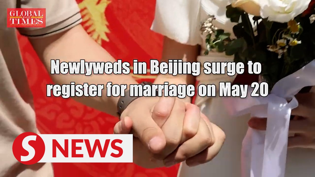 Newlyweds in Beijing surge to register for marriage on May 20