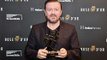 Ricky Gervais will perform stand-up sitting on a 'stage toilet' when his body breaks down