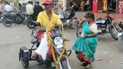 Image of the day: Beggar buys moped worth Rs 90,000 for his ailing wife