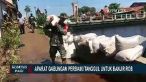 Warga dan Aparat Gabungan Perbaiki Tanggul Sepanjang 13 Meter untuk Mencegah Banjir Rob Meluas