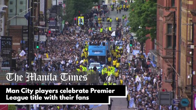 Man City players celebrate Premier League title with their fans