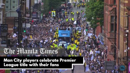 Man City players celebrate Premier League title with their fans