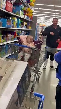 Baby Bursts Out Laughing at Game of Frisbee