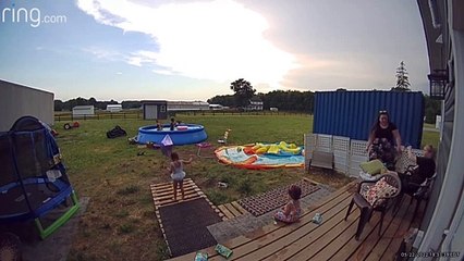 Plastic Chair Collapses and Woman Falls Backwards into Fence