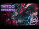 Tattoo Artist Inks Superhero Tattoo on Person