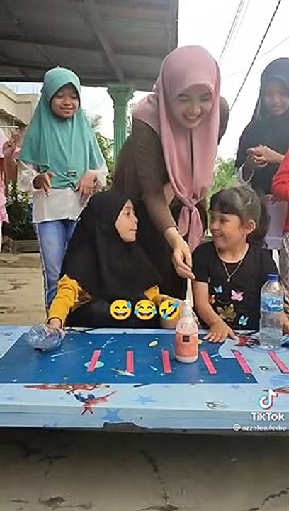 Trik main lempar botol