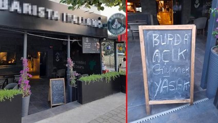 "Açık giyinmek yasak" yazısı olan kafede şort giyen genç kızları dışarı çıkartan personelin işine son verildi