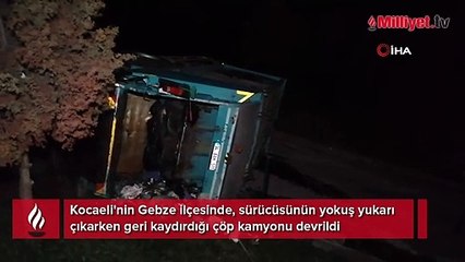 Rampada geri kayan çöp kamyonu devrildi