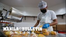 Bakery staff prepares Enhanced Nutribuns in Mandaluyong City