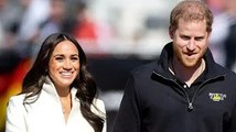 'Totally besotted' Harry under 'smothering' Meghan's spell in US but Duke 'misses royals'