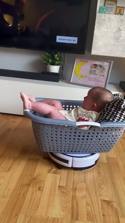 Baby Goes for Roomba Ride