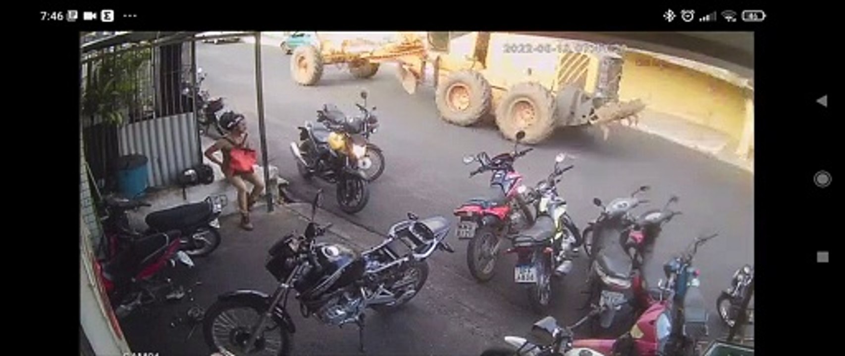 Mechanical Failure Causes Tractor to Push Car Into Workshop