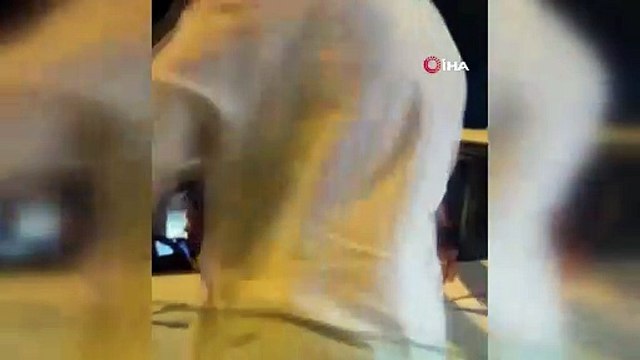 Camdan sarkıp vuramayınca, otomobilinden inip saldırdı