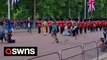 Queen’s jubilee parade shows protesters storming onto the Mall before being dragged away by the police