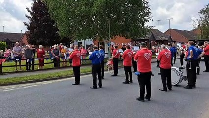 Stowmarket Concert Band stopped outside Town Green to play residents a tune