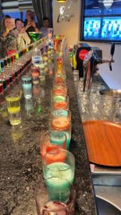 Rows of Colorful Drinks Expertly Mixed