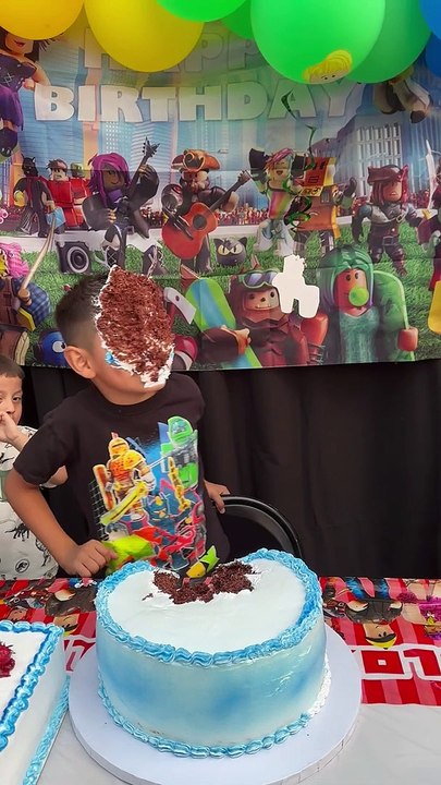 Birthday Boy Bites Own Cake