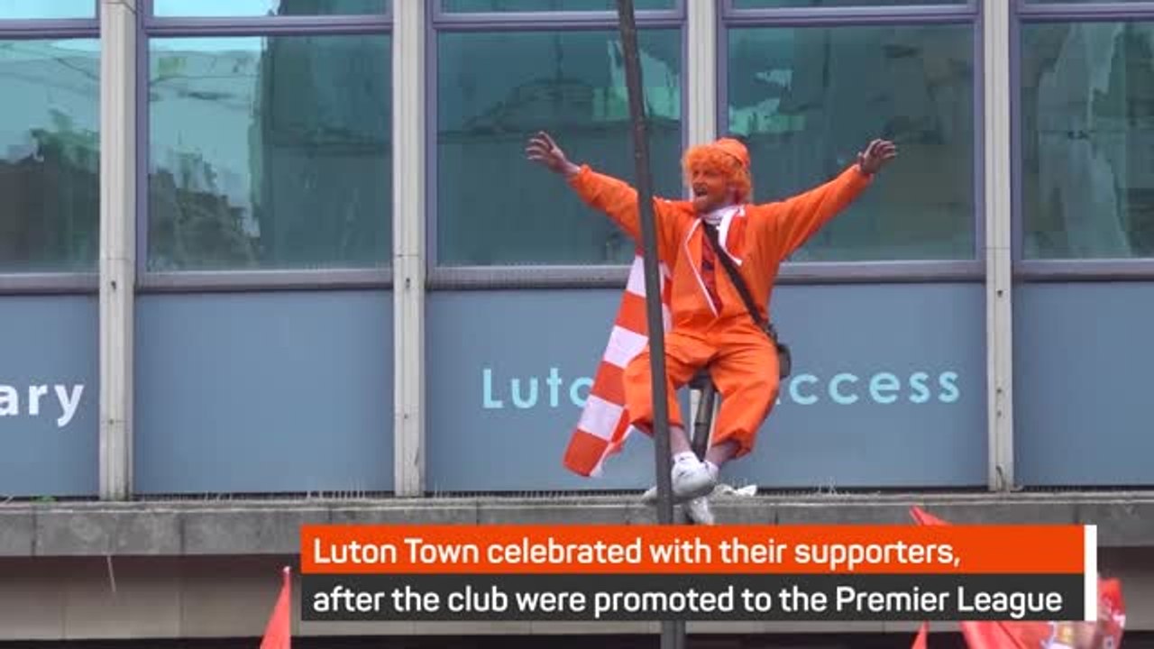 Luton Town celebrate promotion with their fans